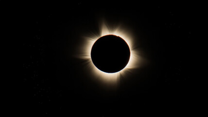 Obraz premium Solar eclipse view: moon blocks sun, creating glowing halo. Awe-inspiring, celestial, dramatic.