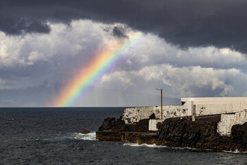 Rainbow over the sea on stormy day Atlantic Ocean Azores islands