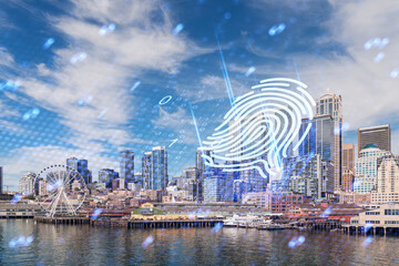 Naklejka premium Seattle cityscape with hologram fingerprint overlay. Digital, cyber security concept on an urban background with clear sky. Double exposure