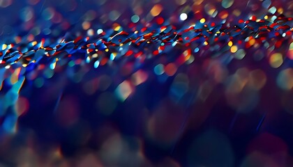 Obraz premium an abstract, bokeh-style close-up of shimmering lights. The vibrant colors and scattered points of light give it a festive appearance