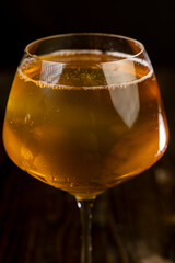 cold apple juice drink in a clear glass
