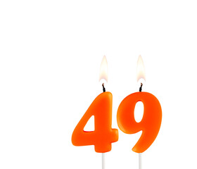 Orange birthday candle on white background - Number 49