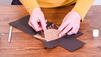 Online Class Teacher Demonstrates Brown Bag Puppet Crafting