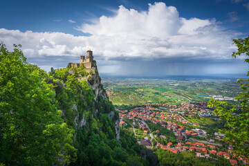Fototapeta premium San Marino, Guaita tower on the Titano mount and panoramic view of Romagna