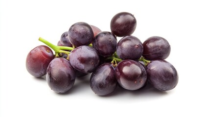 Fresh bunch of ripe purple grapes isolated on white background highlighting their natural color and texture for food and nutrition concepts.