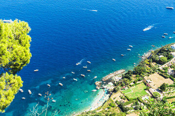 Yachts and boats on the coastline of Capri, Italy.