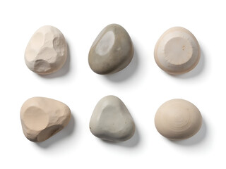 Six And Seven Pebbles Isolated On A White Background, Sea Stones Waiting To Be Discovered One By One. 00001