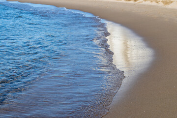 Sandy beach of medieval small touristic coastal town Sperlonga and sea shore, Latina, Italy