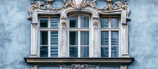 Intricate vintage window design highlighting historical elegance and architectural charm on a classic building facade
