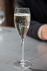 Tasting sparkling white wine, traditional champagne method making of cremant in caves on Moselle river valley in Luxembourg, wine tour and visiting caves