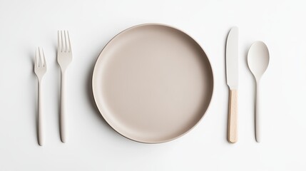 Empty plate accompanied by a spoon knife and fork on a white background Features mesh and clipping mask
