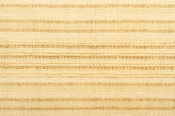 Textura fondo de tejido de color beige y marrón. Vista de frente y de cerca