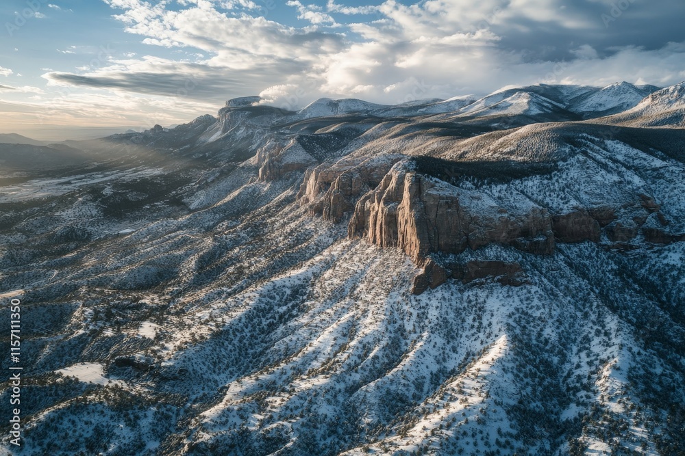 Poster cliff formations covered with dense forests, softly illuminated by sunlight filtering through clouds