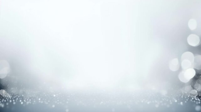 Blurred silver background with bokeh lights and sparkles