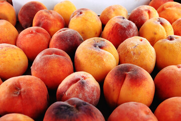 Close Up Of Fresh Red And Yellow Ripe Peaches.