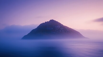 Fototapeta premium A serene mountain rises from peaceful waters at twilight, wrapped in soft mist and hues of purple and blue, inviting calm and tranquility.