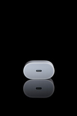 Fast charger for Phone with c-type cable on black background.