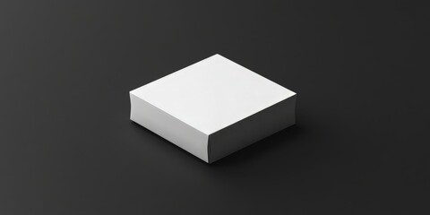 A mockup depicting a white packaging box set against a black backdrop creates a striking visual contrast between the white box and the dark background.