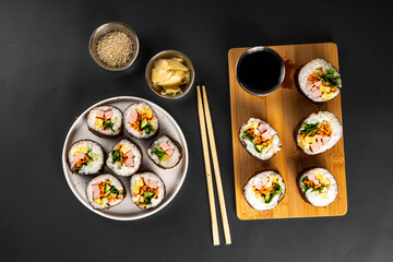 Traditional Korean food kimbap, with ham, vegetables and lettuce