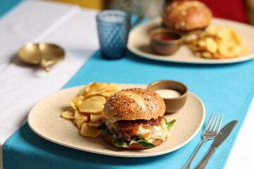 Cheeseburger with Caramelized Onions and Potato Chips