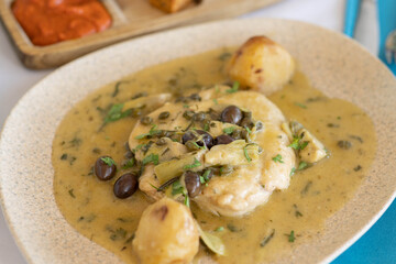 Chicken in Herb Sauce with Potatoes and Olives