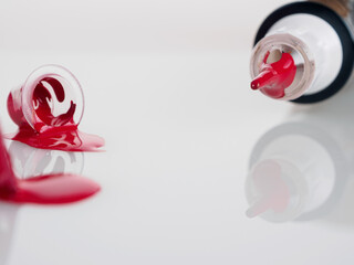 Close-up of colored bright red tattoo ink in a jar, highlighting color saturation and quality to create unique works.