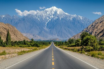 Majestic mountain view along a deserted highway in a remote landscape during bright daylight