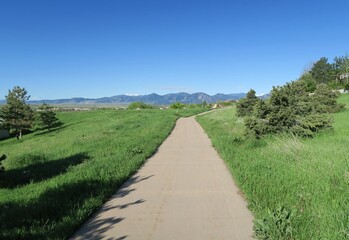 Spring trail with views of the Rocky Mountains, Colorado