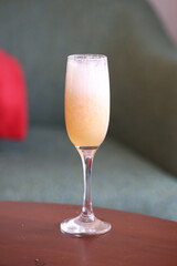 Refreshing Peach Bellini in a Champagne Flute