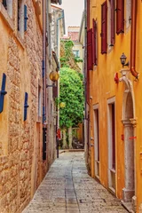 Fototapete Rund narrow street in the old town, Porec, Istris, Croatia, Europe, October 2024 © Michael Knöbl