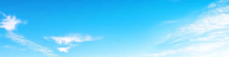 Serene gradient blue sky with few scattered clouds, creating a calm and tranquil atmosphere, perfect as a background for design projects and presentations.