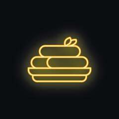 This glowing neon icon evokes the relaxing atmosphere of a spa, with towels neatly stacked and ready for use