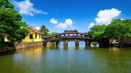 Scenic Bridge Over River in Charming Traditional Town with Trees and Cloudy Sky Reflection