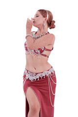 Dancer in red oriental costumes dance belly dance on the white background