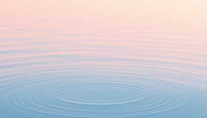 Abstract reflection of sunset over ocean with ripples and waves under a blue sky