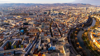 Vienna, Austria Aerial View: Sunset Over City Center and Canal. Top cinematic aerial view. 