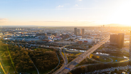 Fototapeta premium Vienna, Austria Aerial View: Sunset Over City Center and Canal. Top cinematic aerial view. 