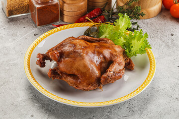 Baked small chicken with spices