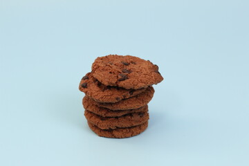 a close up of chocolate cookies isolated on bright background. Food concept photo.