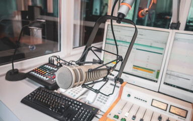 Professional microphone and sound mixer in radio station studio