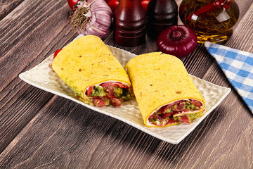 Burrito with tuna and vegetables wrap