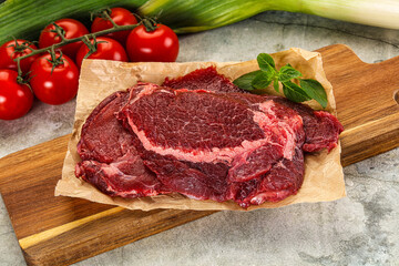 Raw beef cheeks cut for cooking