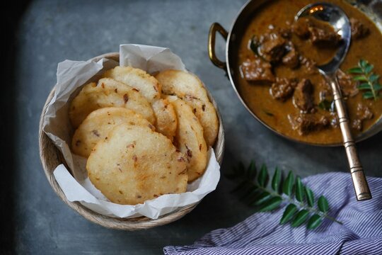 Ney Patha or Pathiri - Kerala Malabar breakfast served with Lamb curry