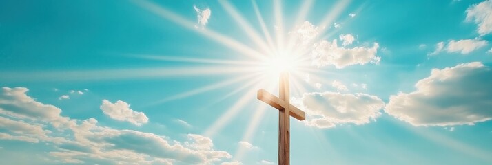 A radiant cross shines against a vibrant blue sky, symbolizing resurrection and hope during Easter, with sun rays illuminating the scene, enhancing feelings of renewal and divine inspiration