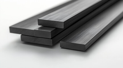 Black steel flat bars, three pieces stacked together on a white background