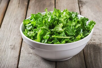 Fresh green kale in white bowl, placed on rustic wooden surface
