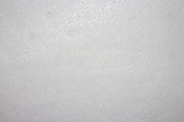 The texture of white foam.White foam background.The surface is made of foam.