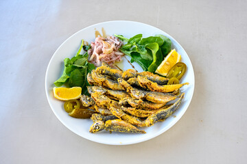 Fried Anchovies (Turkish Name: Hamsi Tava) .Hamsi, istavrit, sardalya tava. Balik kizartma. Izgara cipura levrek, palamut  yesil salata.