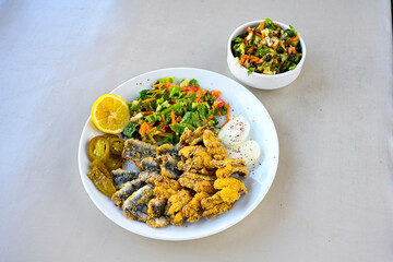 Fried Anchovies (Turkish Name: Hamsi Tava) .Hamsi, cinekop, kiraca, barbun,  mezgit,  istavrit, sardalya tava. Balik kizartma. Izgara cipura, levrek bugulama, 