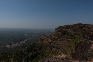 The Naga Cave in Bueng Kan, Thailand, features serpent-like rock formations tied to Naga mythology, attracting visitors to Phu Langka National Park for nature and spirituality